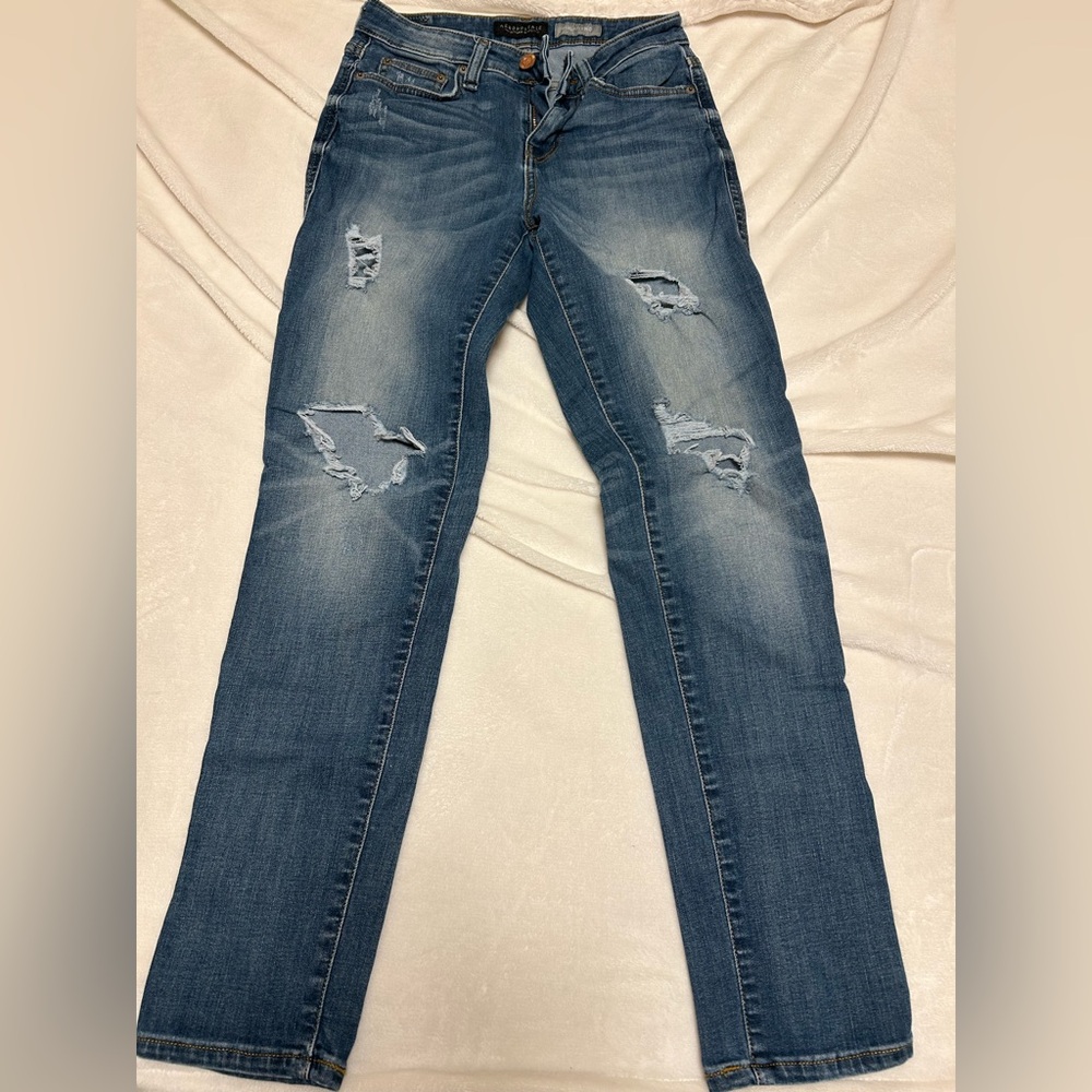 Distressed Blue Jeans